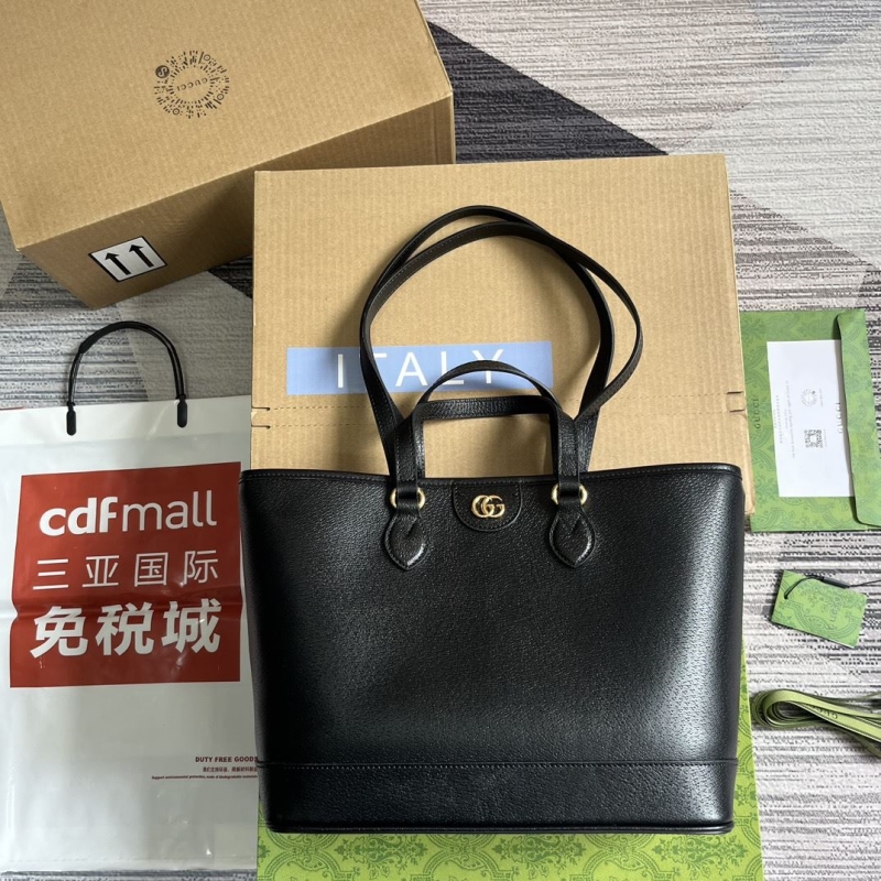 G*u*i shopping bags